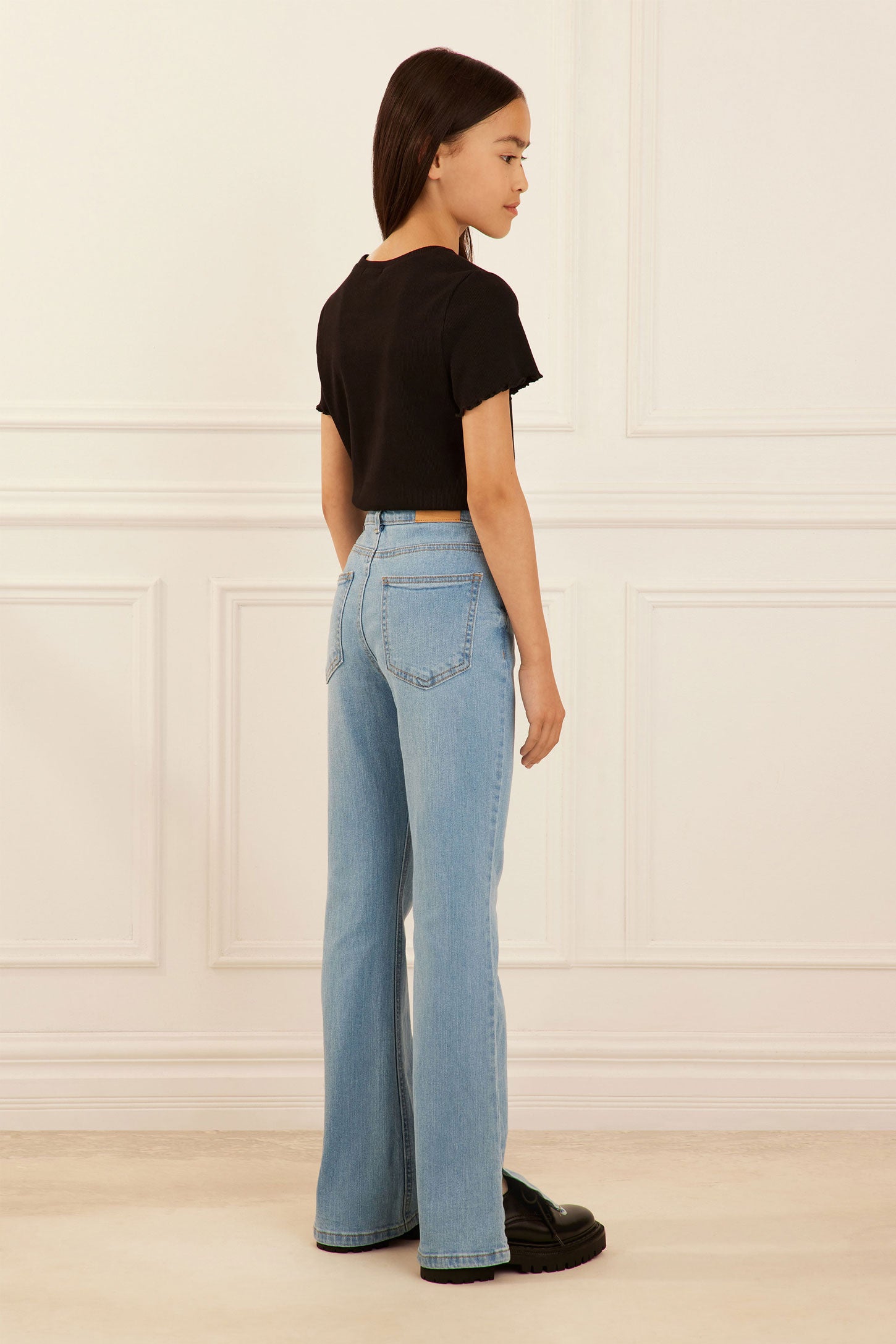 Flared leg high waisted jeans Teenage girl